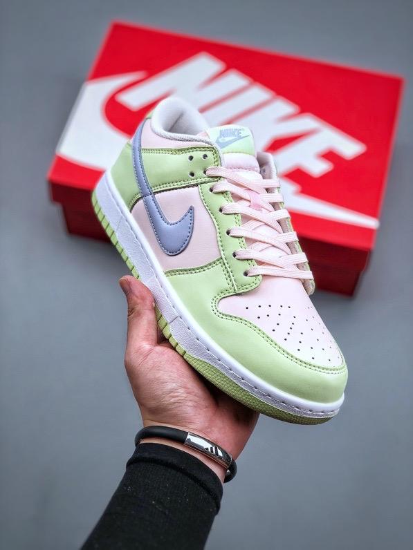 NIKE DUNK LOW Barely Green Nike Dunk Low 'Barely Green' sneaker featuring pastel green leather upper with peach-colored Swooshes.  The image showcases the Nike Dunk Low 'Barely Green' sneaker, highlighting its pastel green leather upper complemented by peach-colored Swooshes and a white midsole. The design offers a fresh and subtle aesthetic, perfect for various styles.

