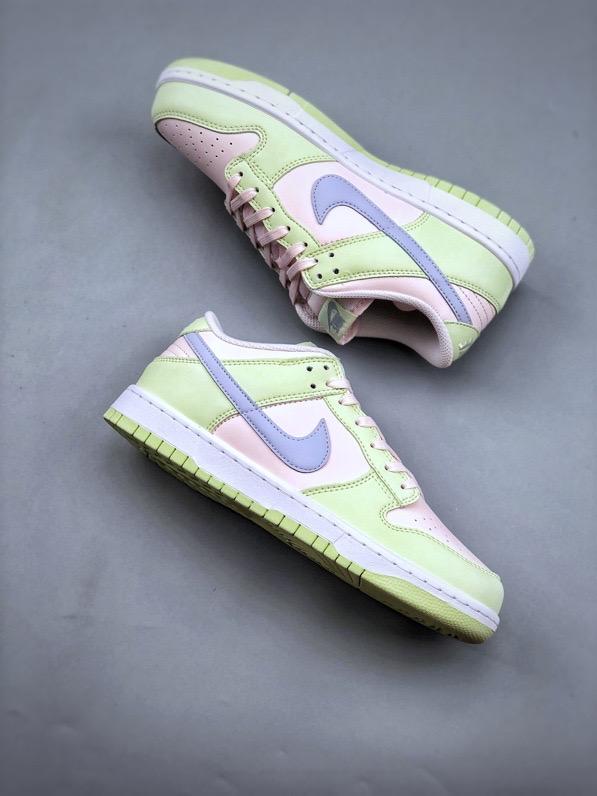 NIKE DUNK LOW Barely Green Nike Dunk Low 'Barely Green' sneaker featuring pastel green leather upper with peach-colored Swooshes.  The image showcases the Nike Dunk Low 'Barely Green' sneaker, highlighting its pastel green leather upper complemented by peach-colored Swooshes and a white midsole. The design offers a fresh and subtle aesthetic, perfect for various styles.

