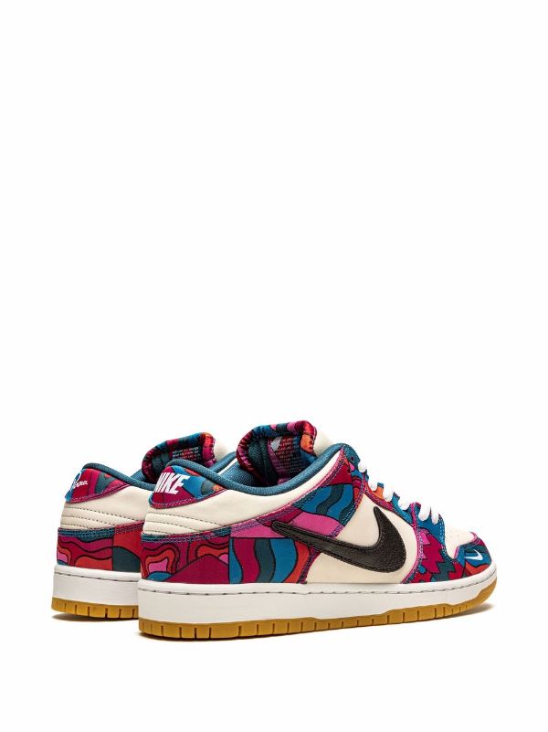 Nike SB Dunk Low x Parra – Lateral view showcasing colorful abstract patterns.

Nike SB Dunk Low x Parra – Detail of truncated black leather Swoosh and embroidered mini-Swoosh.

Nike SB Dunk Low x Parra – Gum rubber outsole providing durable traction.