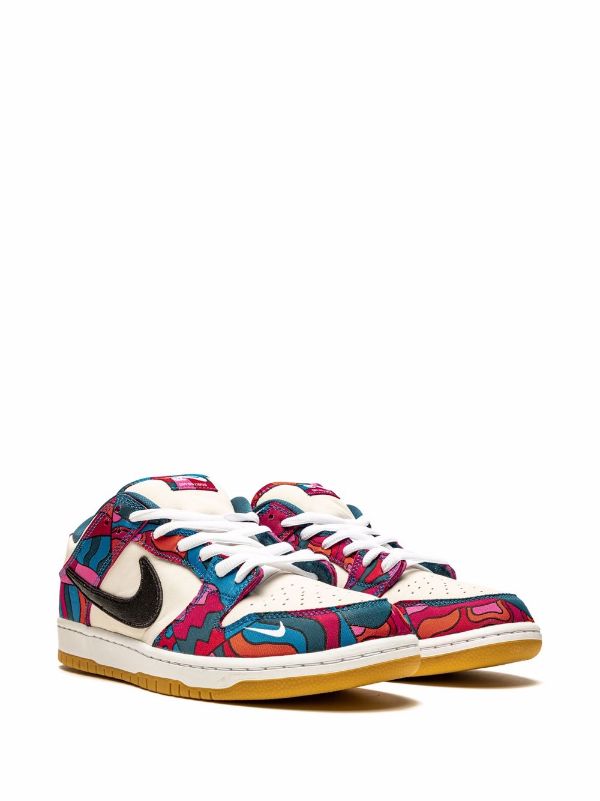 Nike SB Dunk Low x Parra – Lateral view showcasing colorful abstract patterns.

Nike SB Dunk Low x Parra – Detail of truncated black leather Swoosh and embroidered mini-Swoosh.

Nike SB Dunk Low x Parra – Gum rubber outsole providing durable traction.