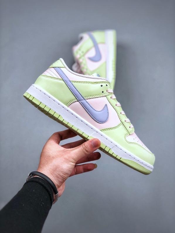 NIKE DUNK LOW Barely Green Nike Dunk Low 'Barely Green' sneaker featuring pastel green leather upper with peach-colored Swooshes.  The image showcases the Nike Dunk Low 'Barely Green' sneaker, highlighting its pastel green leather upper complemented by peach-colored Swooshes and a white midsole. The design offers a fresh and subtle aesthetic, perfect for various styles.

