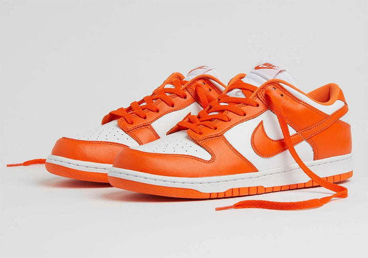 Nike Dunk Low SP Syracuse  Nike Dunk Low "Be True To Your School" – White and Cosmic Clay Sneakers with College-Inspired ColorsNike Dunk Low SP Syracuse  Nike Dunk Low "Be True To Your School" – White and Cosmic Clay Sneakers with College-Inspired Colors